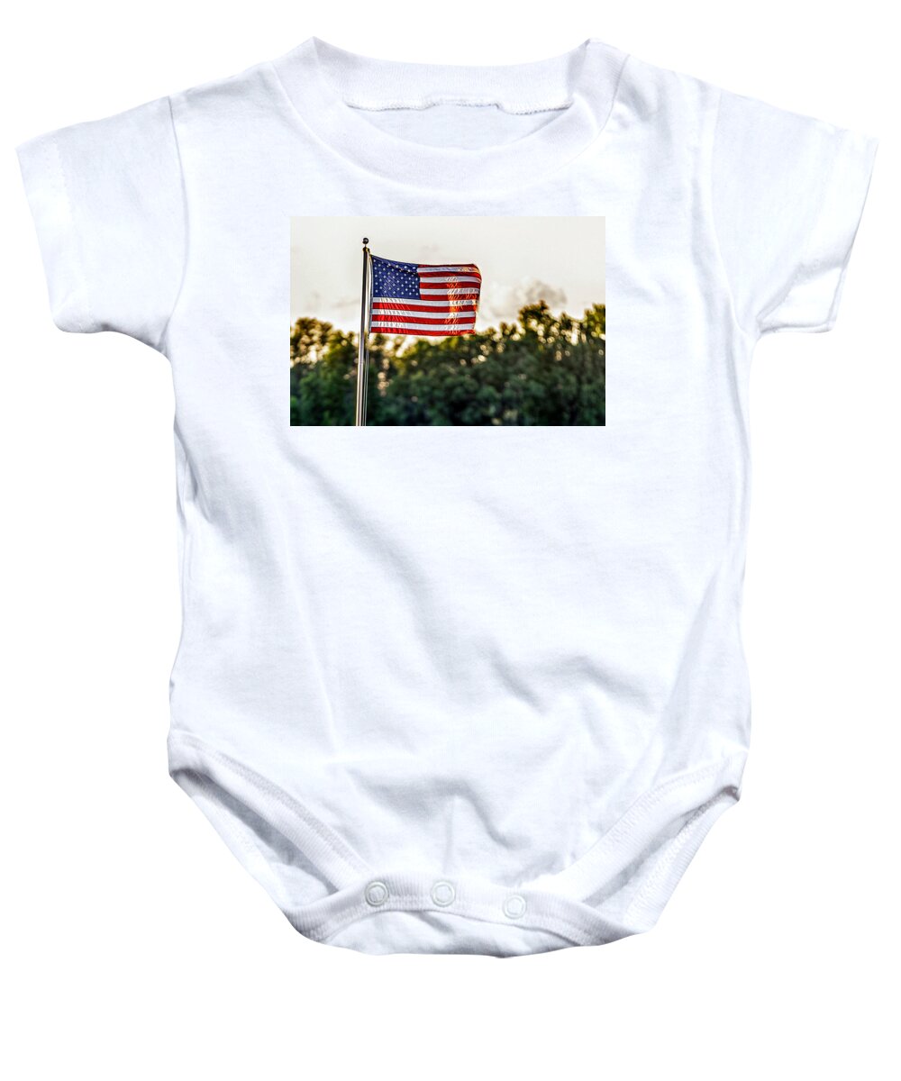Red Baby Onesie featuring the photograph Old Glory Flying High and Proud by Sennie Pierson