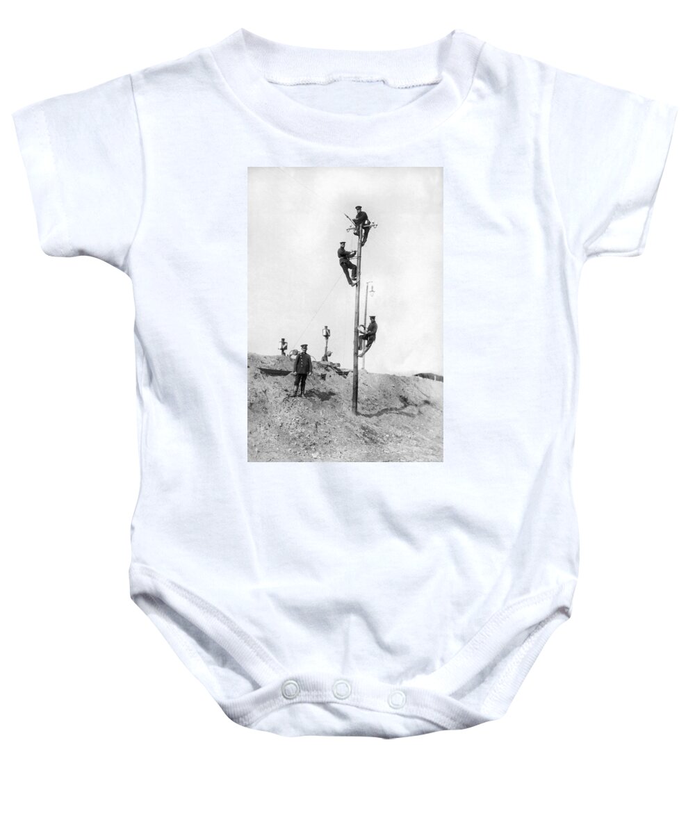 1910s Baby Onesie featuring the photograph Repairing Telegraph Lines by Underwood Archives