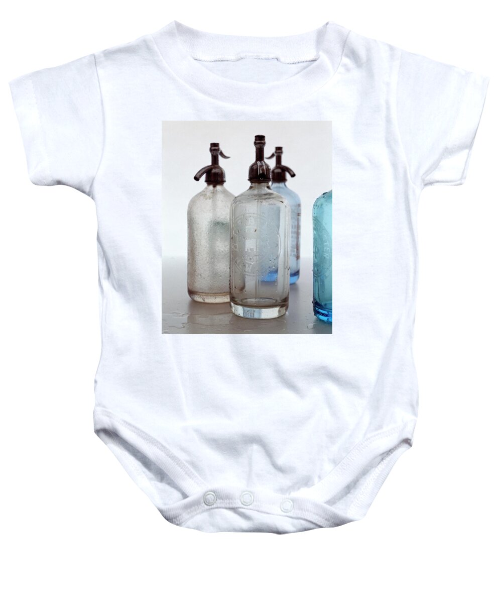 Interior Decoration Baby Onesie featuring the photograph Seltzer Bottles by Romulo Yanes