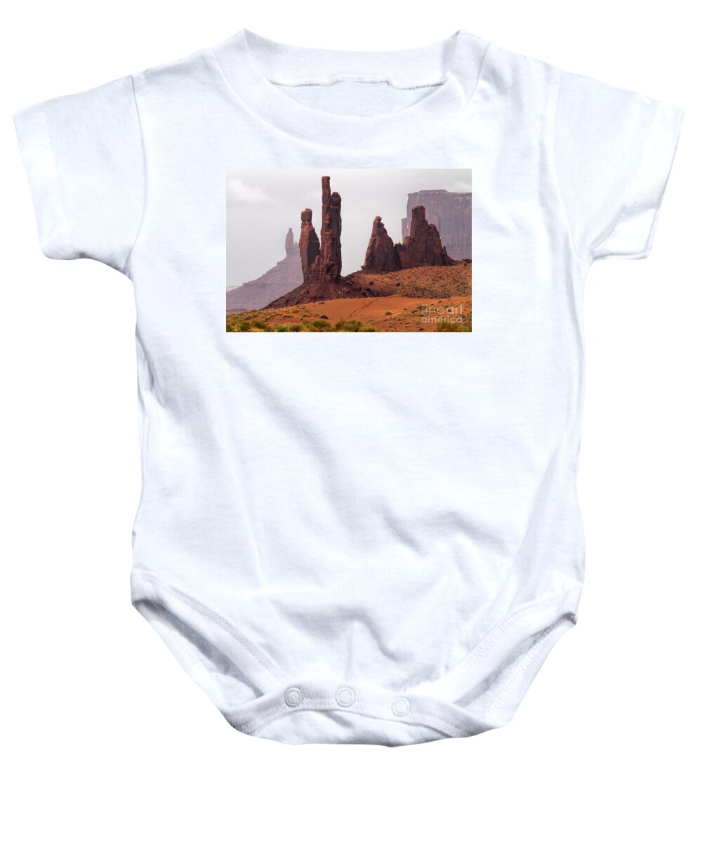 Red Rocks Baby Onesie featuring the photograph Vanguards by Jim Garrison