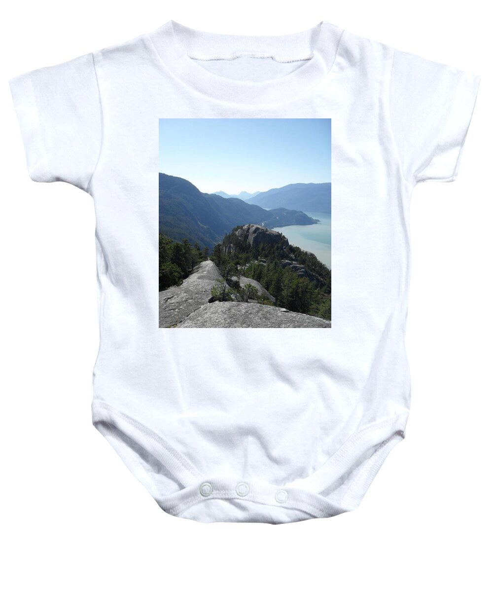 The Chief Baby Onesie featuring the photograph The Chief by Michael Standen Smith