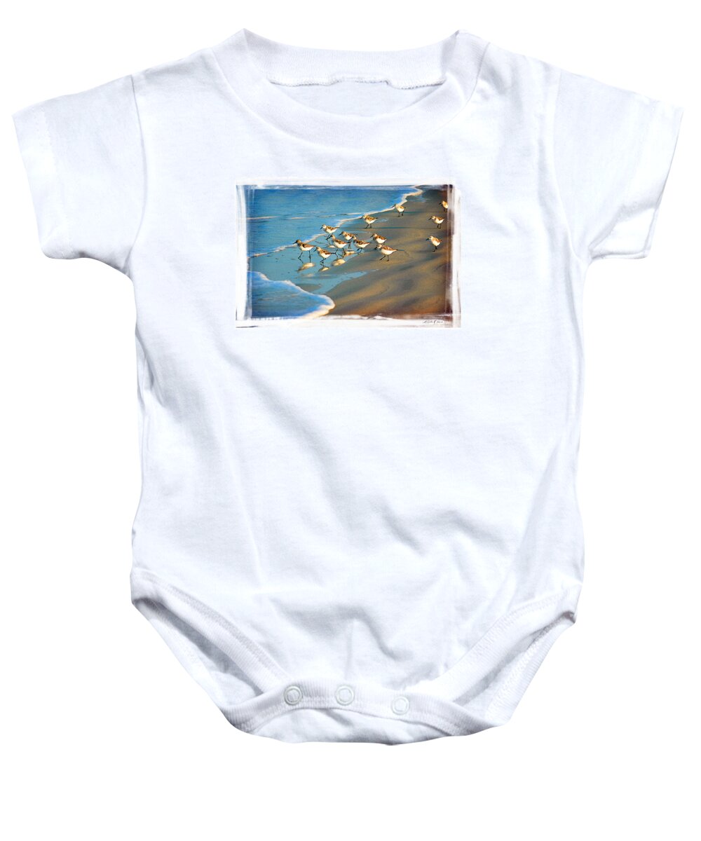 Sand Pipers Baby Onesie featuring the photograph A bevy of pipers by Linda Olsen