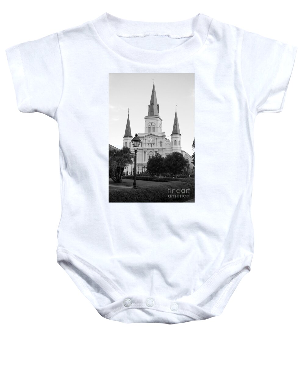 Travelpixpro New Orleans Baby Onesie featuring the photograph Cathedral and Lampost on Jackson Square in the French Quarter New Orleans Black and White by Shawn O'Brien