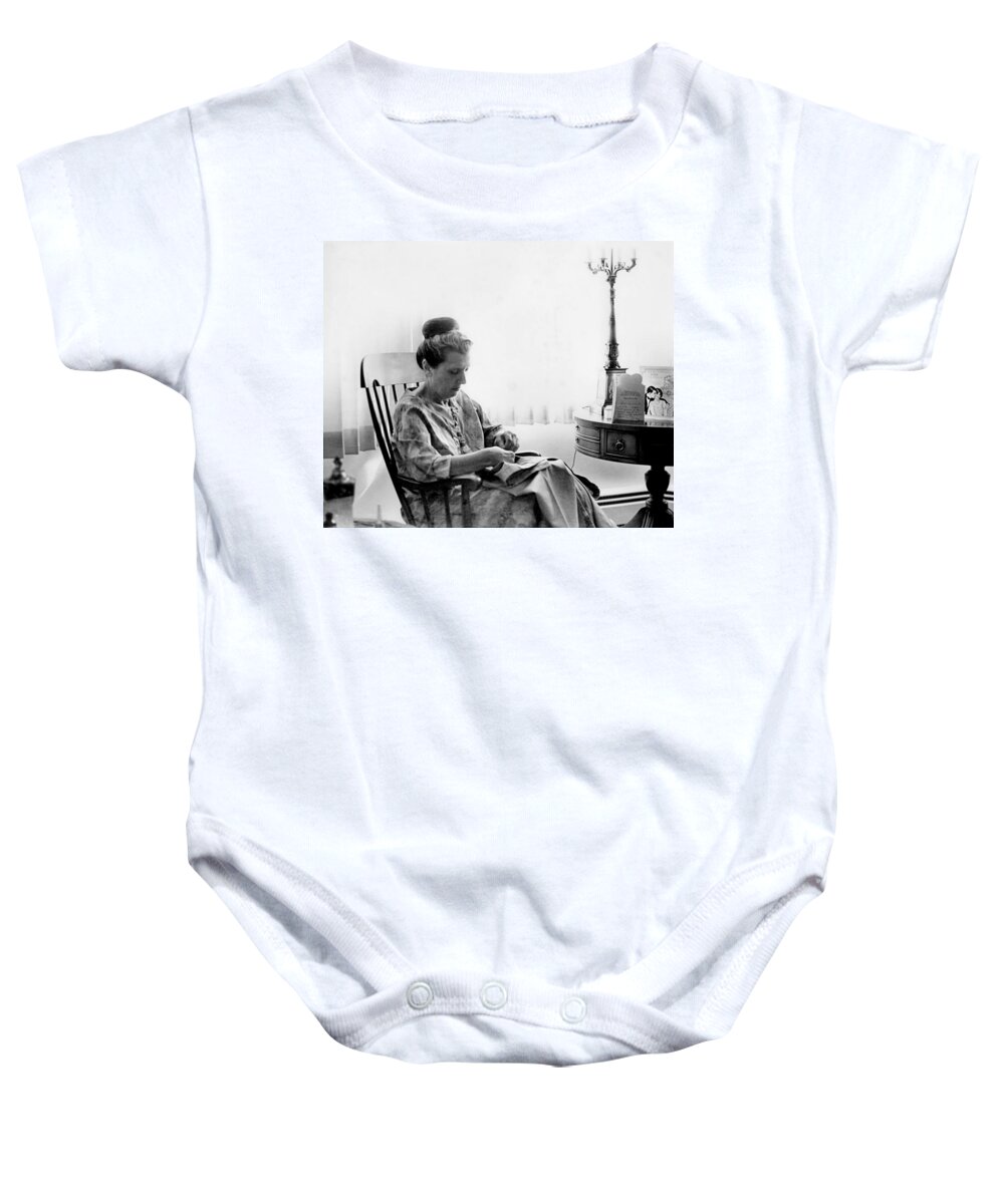 Woman Baby Onesie featuring the photograph Mending More Than Clothes by Rory Siegel