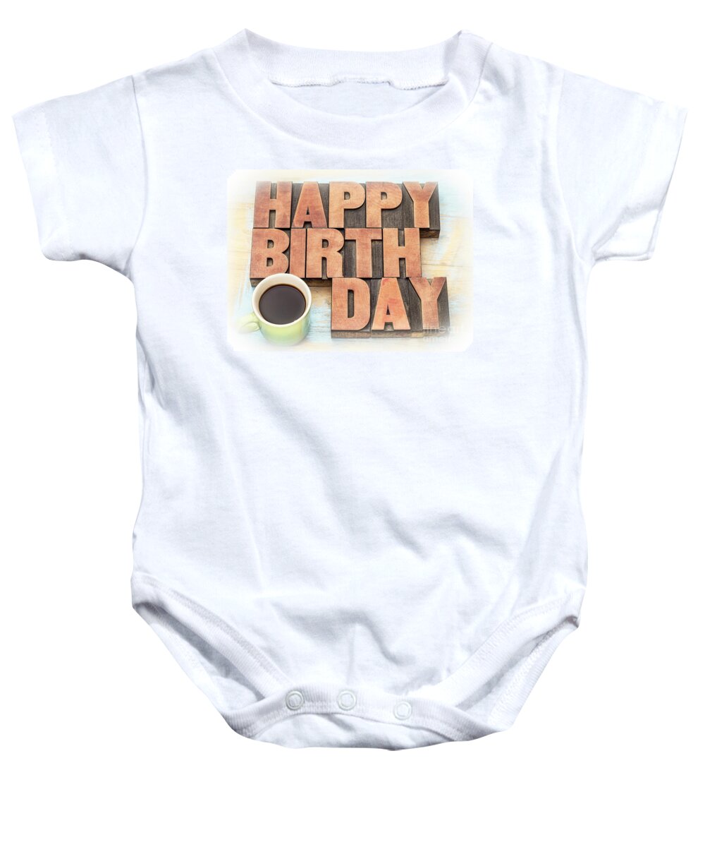 Banner Baby Onesie featuring the photograph Happy Birthday greeting card in wood type #1 by Marek Uliasz
