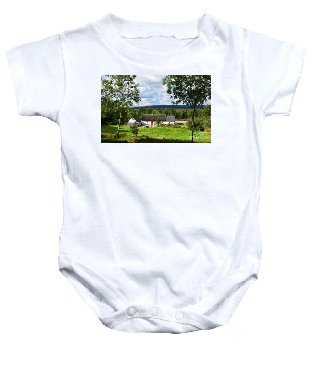 Thatched Cottage Baby Onesie featuring the photograph A country scene #2 by Joe Cashin