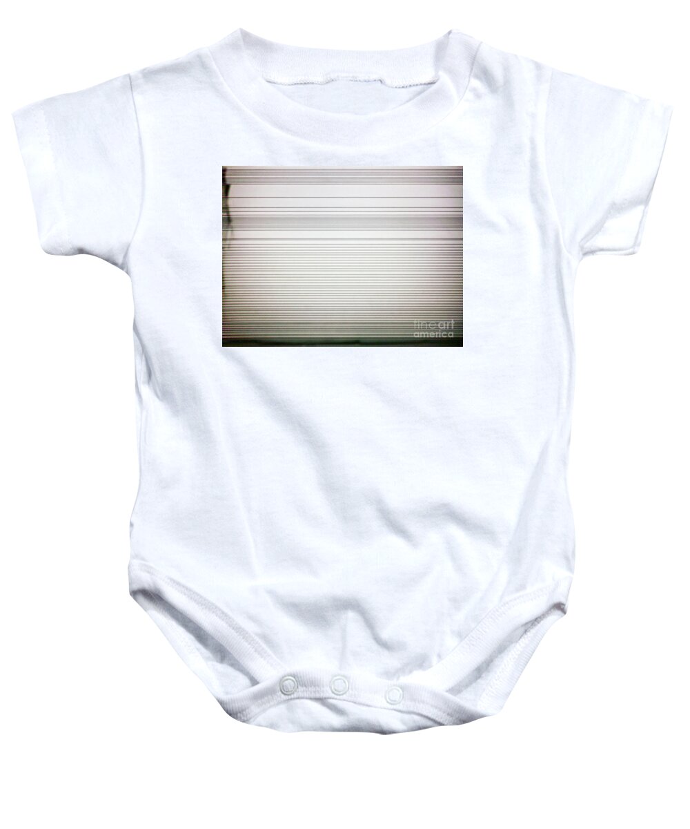 Texture Baby Onesie featuring the photograph Stacked Papers #2 by Fei A