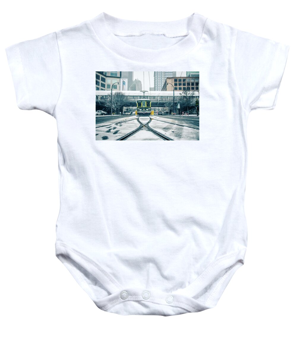 Streetcar Baby Onesie featuring the photograph Streetcar Waiting For Passengers In Snowstrom In Uptown Charlott #4 by Alex Grichenko