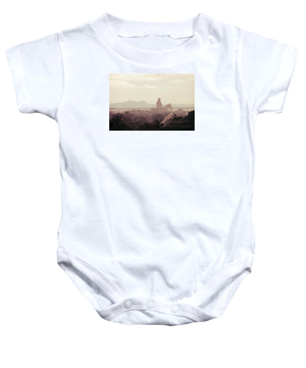 Quarter Baby Onesie featuring the photograph Cowboy Dawn by Todd Klassy