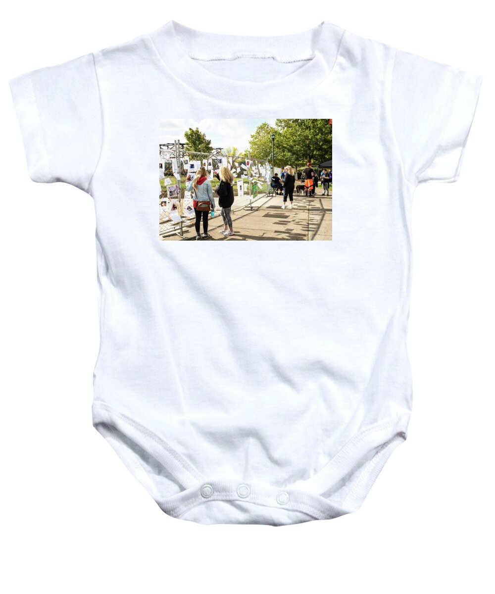 Fence Filled With Lives Baby Onesie featuring the photograph Fence Filled with Lives by Tom Cochran