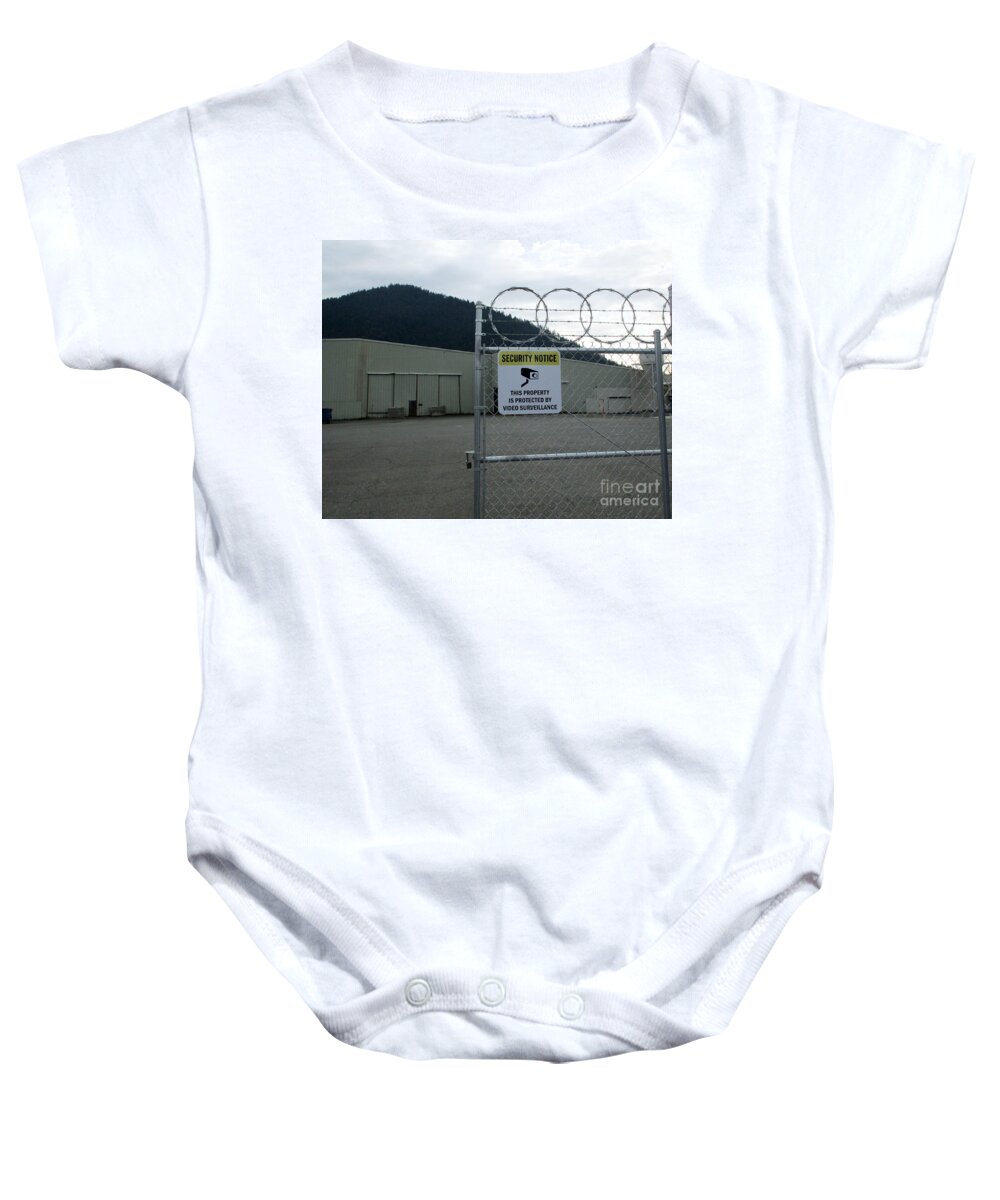 Four Baby Onesie featuring the photograph Four doors Four Spirals and One Lock by Marie Neder