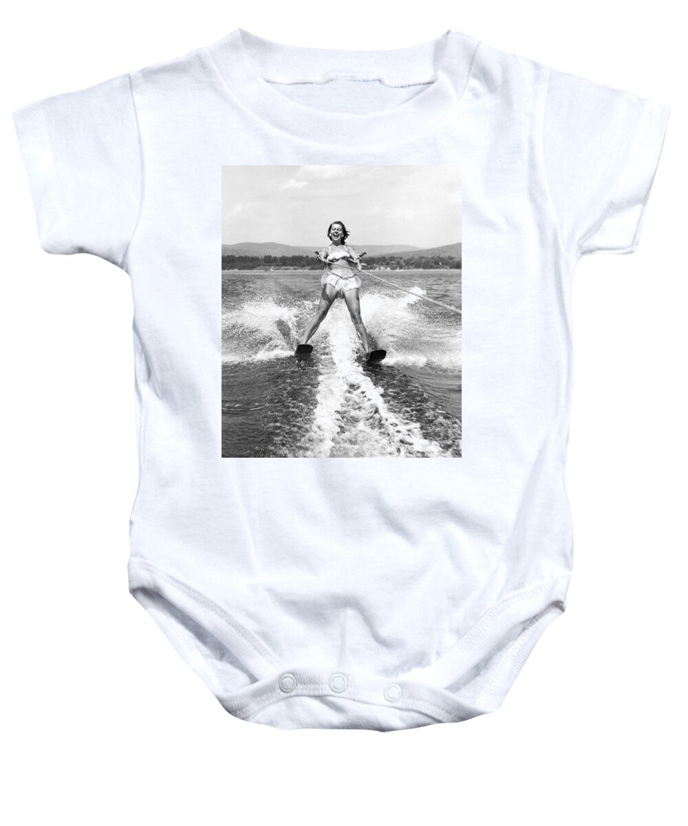 1 Person Only Baby Onesie featuring the photograph Happy Woman Water Skier by Underwood Archives