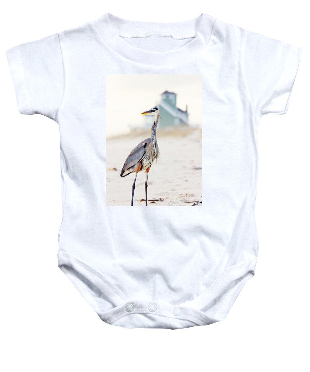 Heron Baby Onesie featuring the photograph Heron and the Beach House by Joan McCool