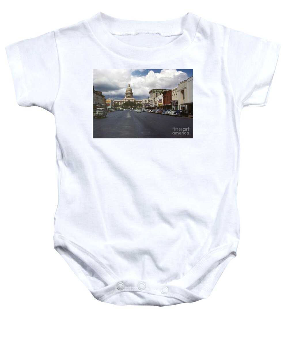 Historical Baby Onesie featuring the photograph In this historical 1950 photo, cars line up and down Congress Avenue in downtown Austin, Texas by Dan Herron