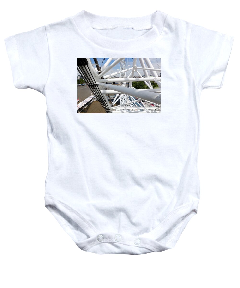 London Baby Onesie featuring the photograph London Eye construction, mechanism as seen from the capsule. London, UK by Michal Bednarek