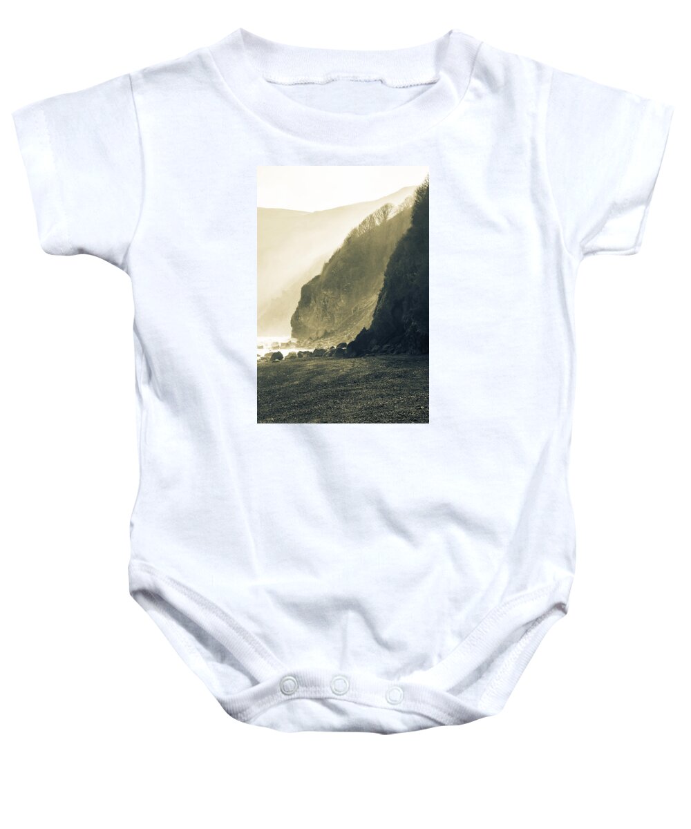 Sea Baby Onesie featuring the photograph Lynmouth beach. by John Paul Cullen