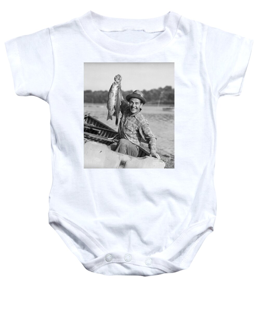 1940s Baby Onesie featuring the photograph Man With Fresh Caught Fish by Debrocke/ClassicStock