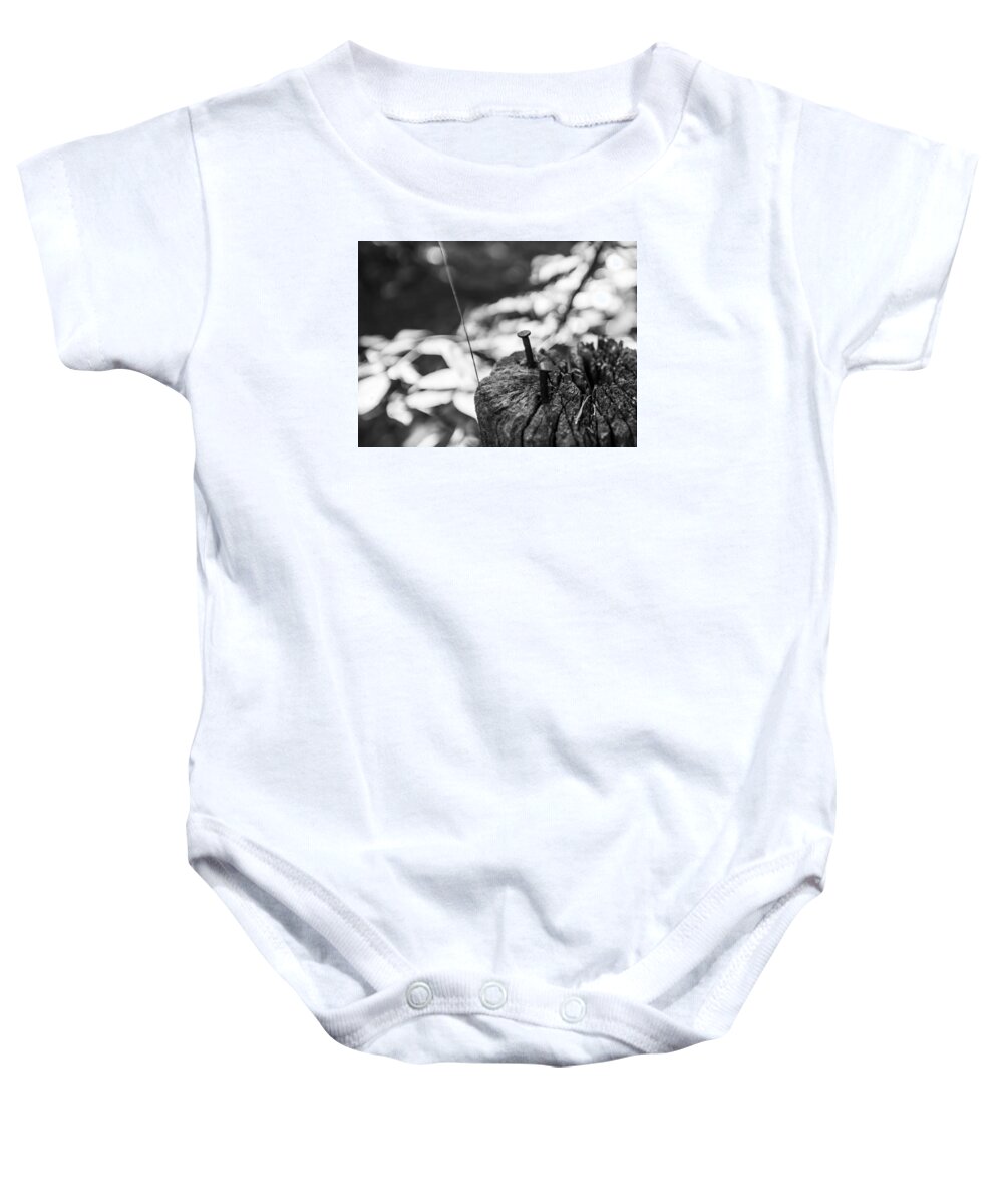 Nails Baby Onesie featuring the photograph Nails by Robert McKay Jones