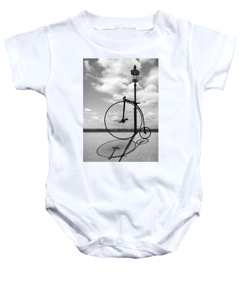 Penny Farthing Baby Onesie featuring the photograph Old Times - Penny Farthing With Street Lamp and Shadows by Gill Billington