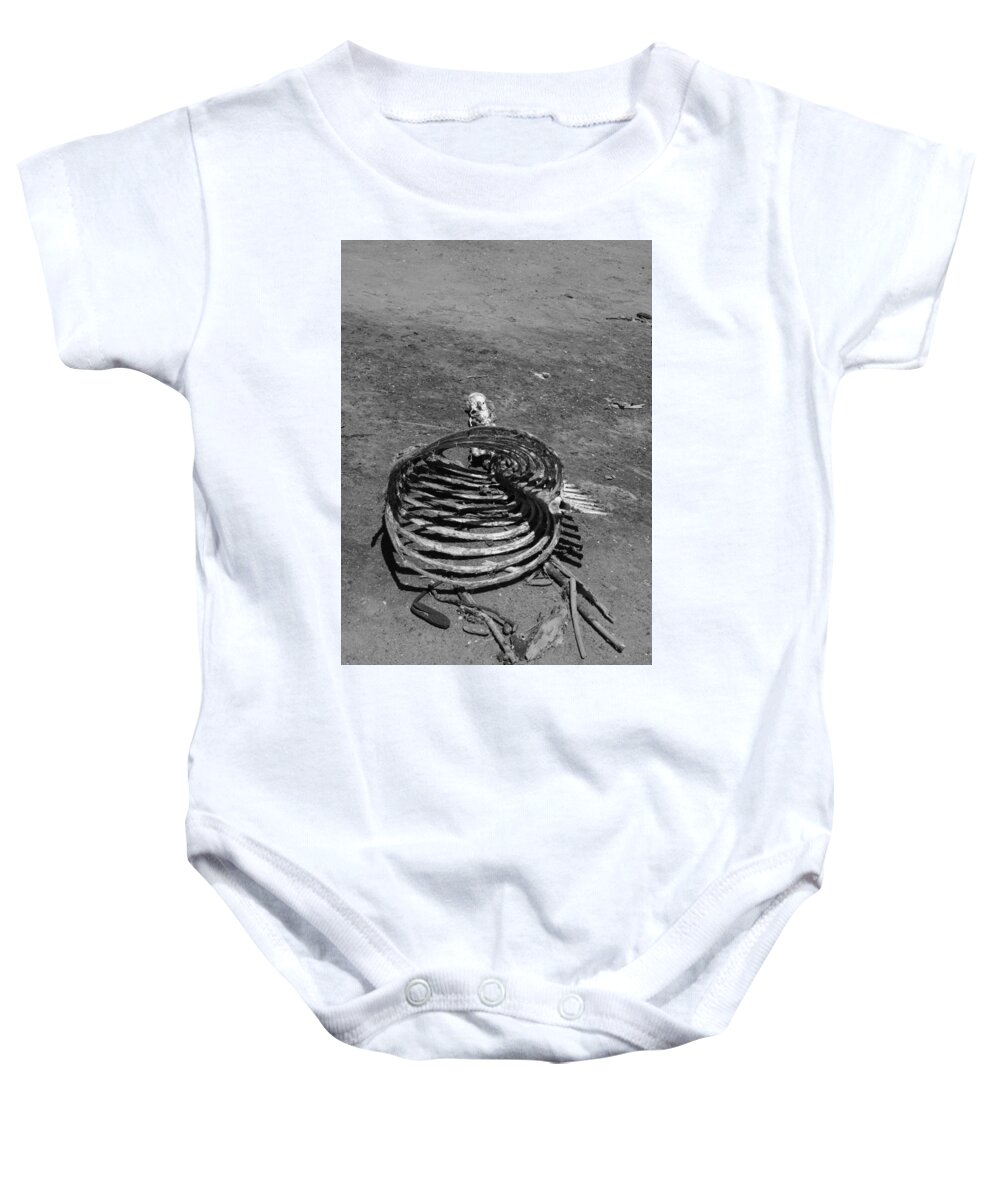 Bones Baby Onesie featuring the photograph Out of control by Marie Neder
