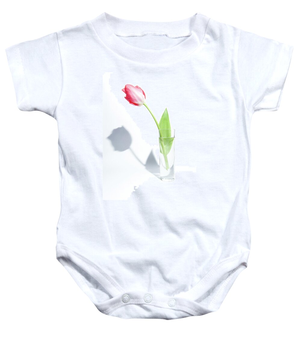 Cut Flower Baby Onesie featuring the photograph Single Tulip in a Glass Vase by Helen Jackson