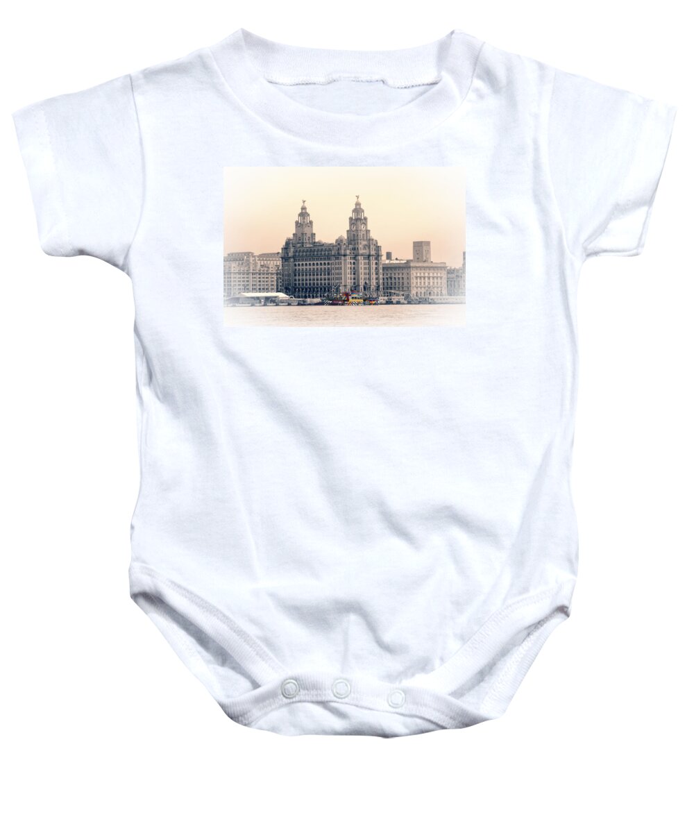 Pier Baby Onesie featuring the photograph Snowdrop Dazzles in front of the Liverbirds by Spikey Mouse Photography