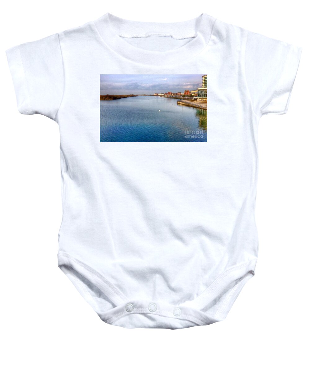 Southport Baby Onesie featuring the photograph The Lone Swan by Joan-Violet Stretch