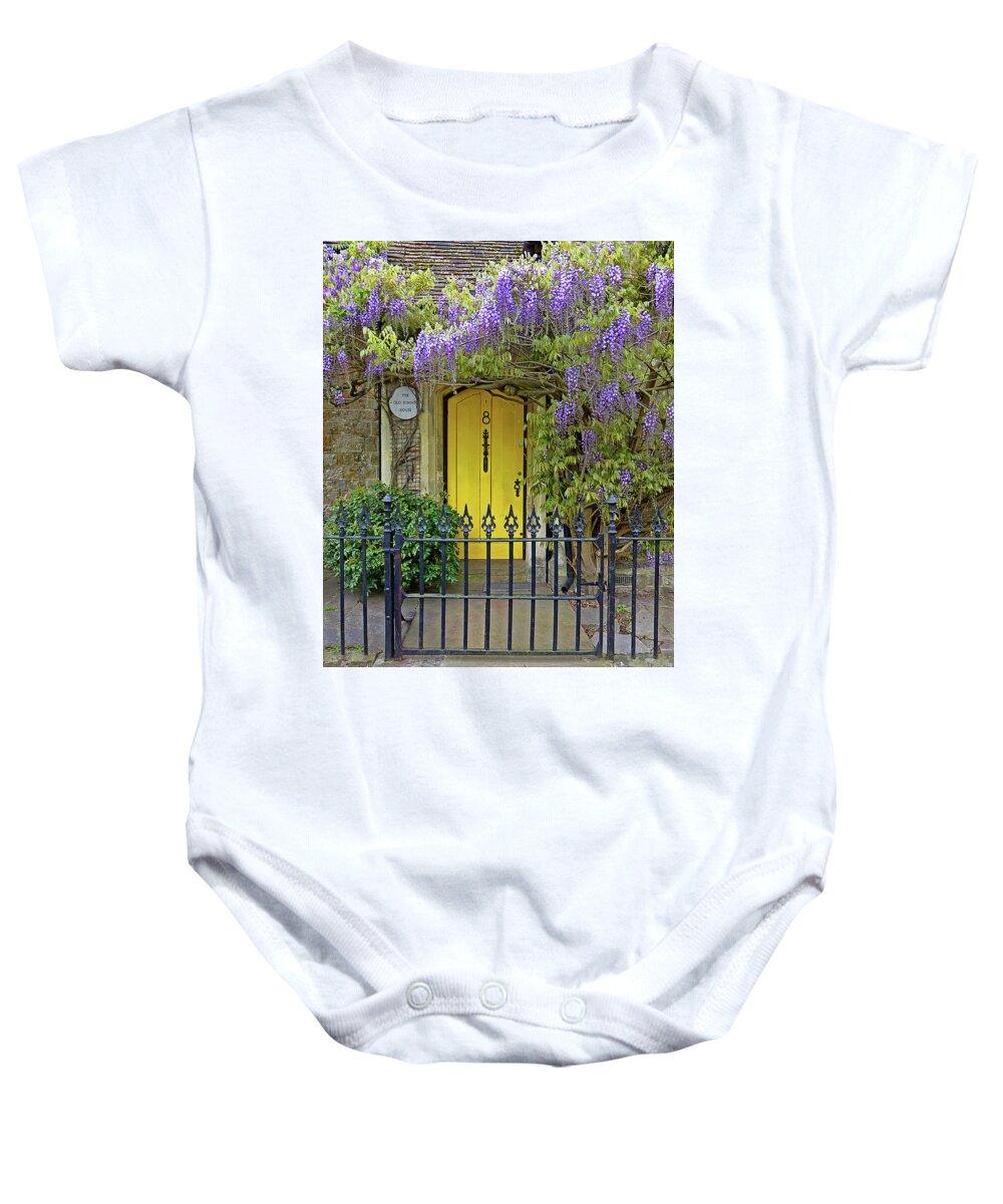Wisteria Baby Onesie featuring the photograph The Old School House Door by Gill Billington