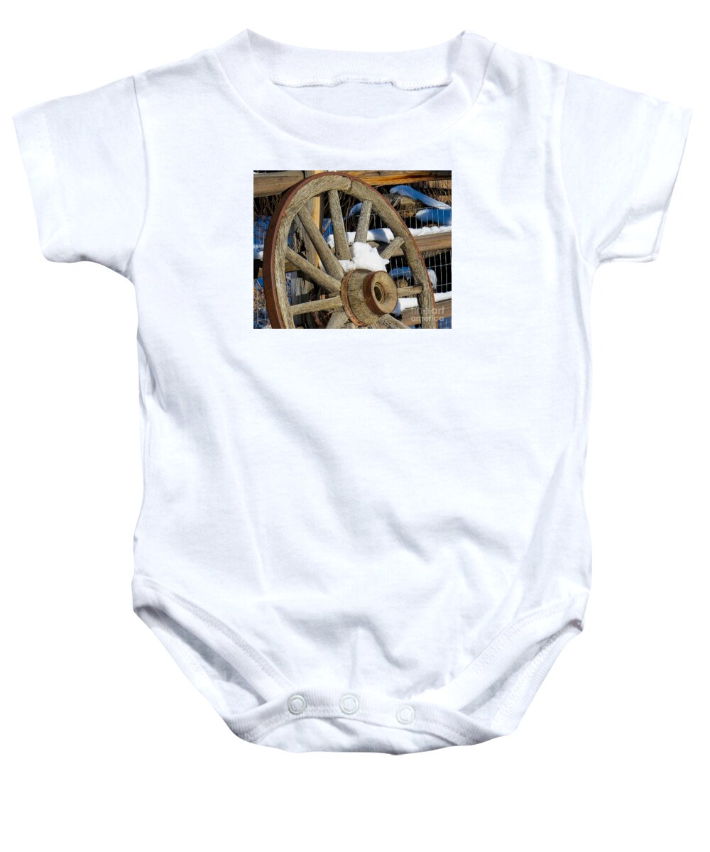 Western Baby Onesie featuring the photograph Wagon Wheel 1 by Christy Garavetto