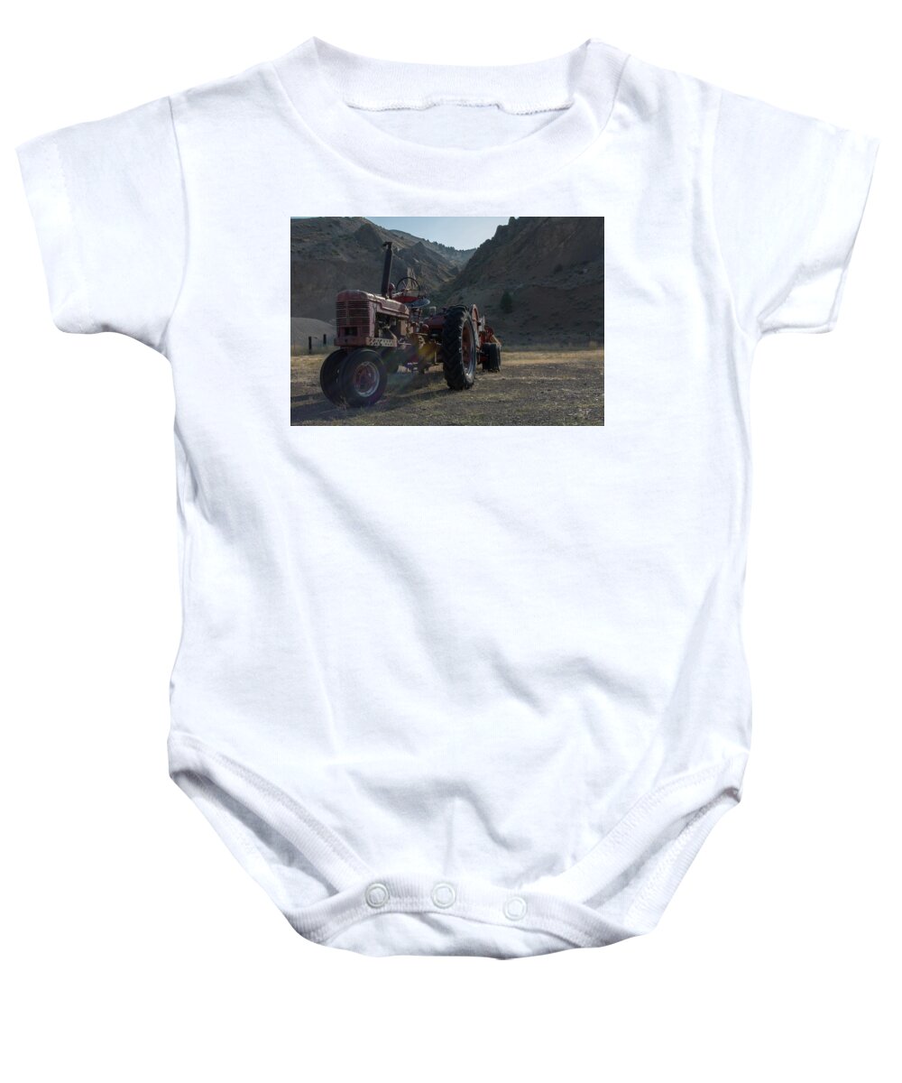 Vintage Farm Tractor Baby Onesie featuring the photograph Winter Hay by Dave Hill