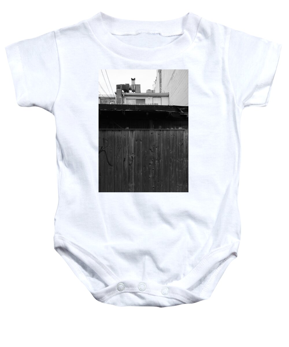 Urban Baby Onesie featuring the photograph Behind The Danforth by Kreddible Trout