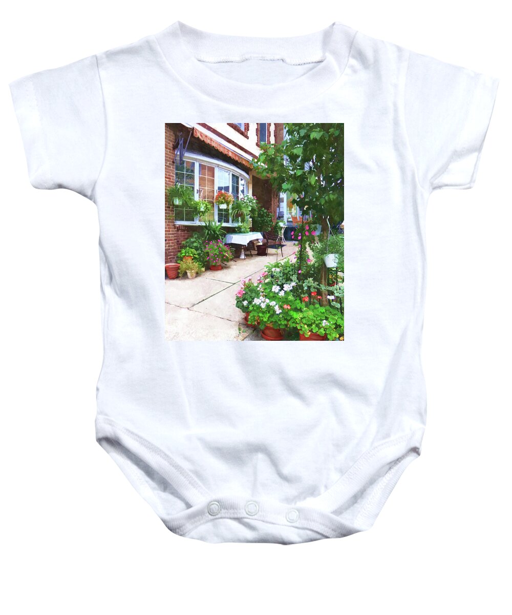 Cafe Baby Onesie featuring the photograph Belvidere NJ - Outdoor Cafe with Flowerpots by Susan Savad
