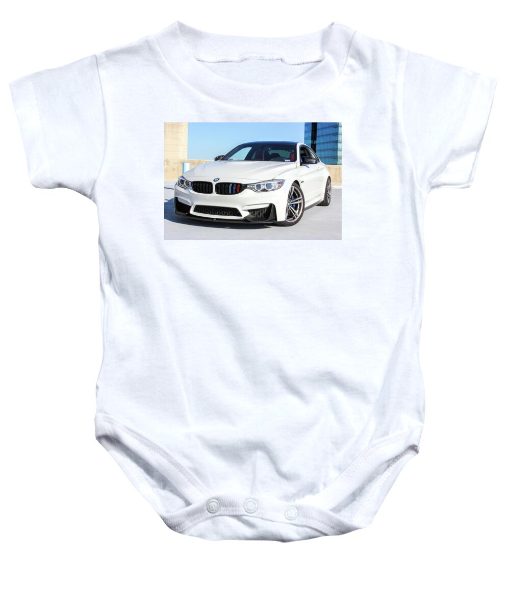 Bmw M4 Baby Onesie featuring the photograph Bmw M4 by Rocco Silvestri
