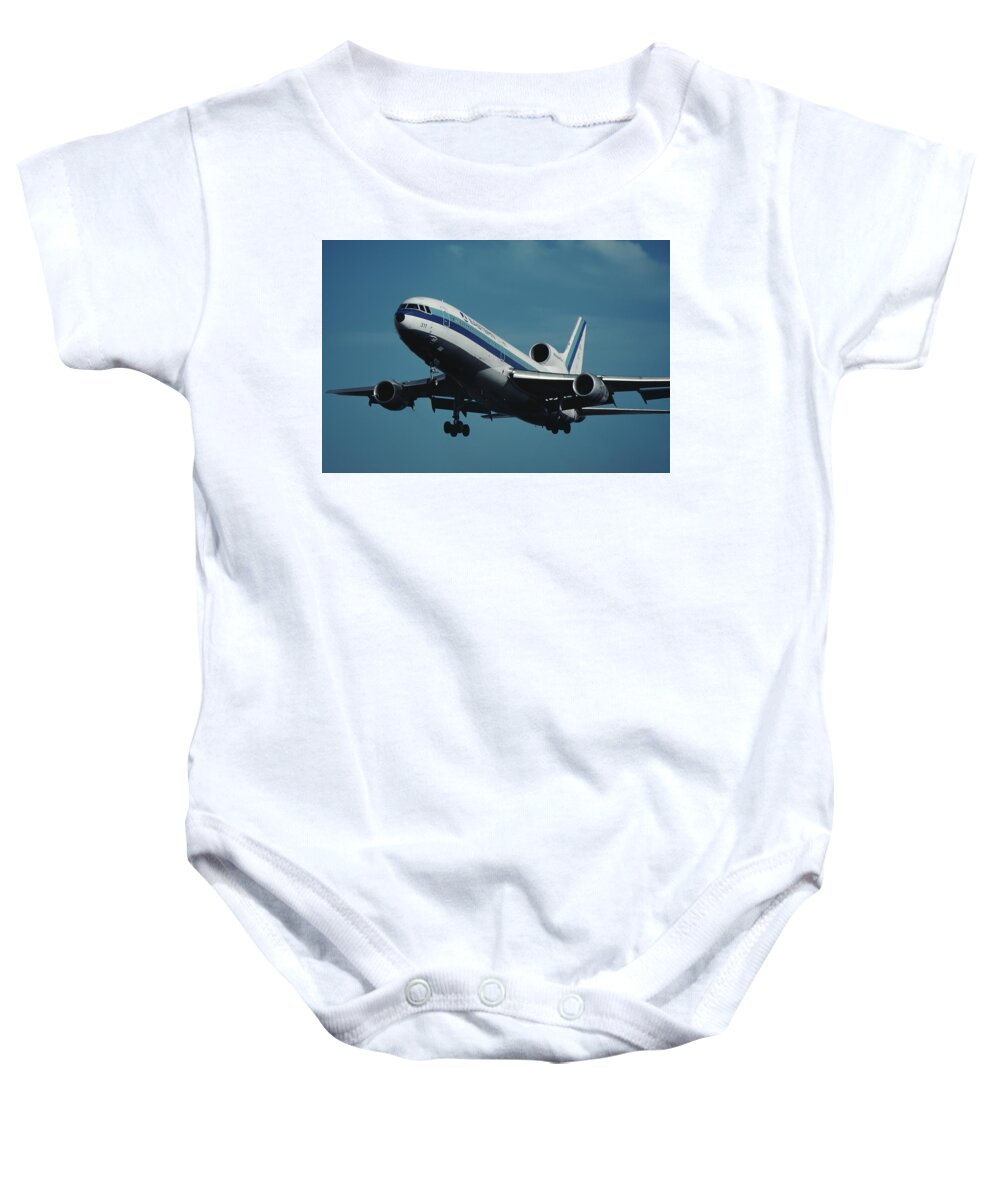 Eastern Airlines Baby Onesie featuring the photograph Eastern L-1011 TriStar Whisperliner by Erik Simonsen