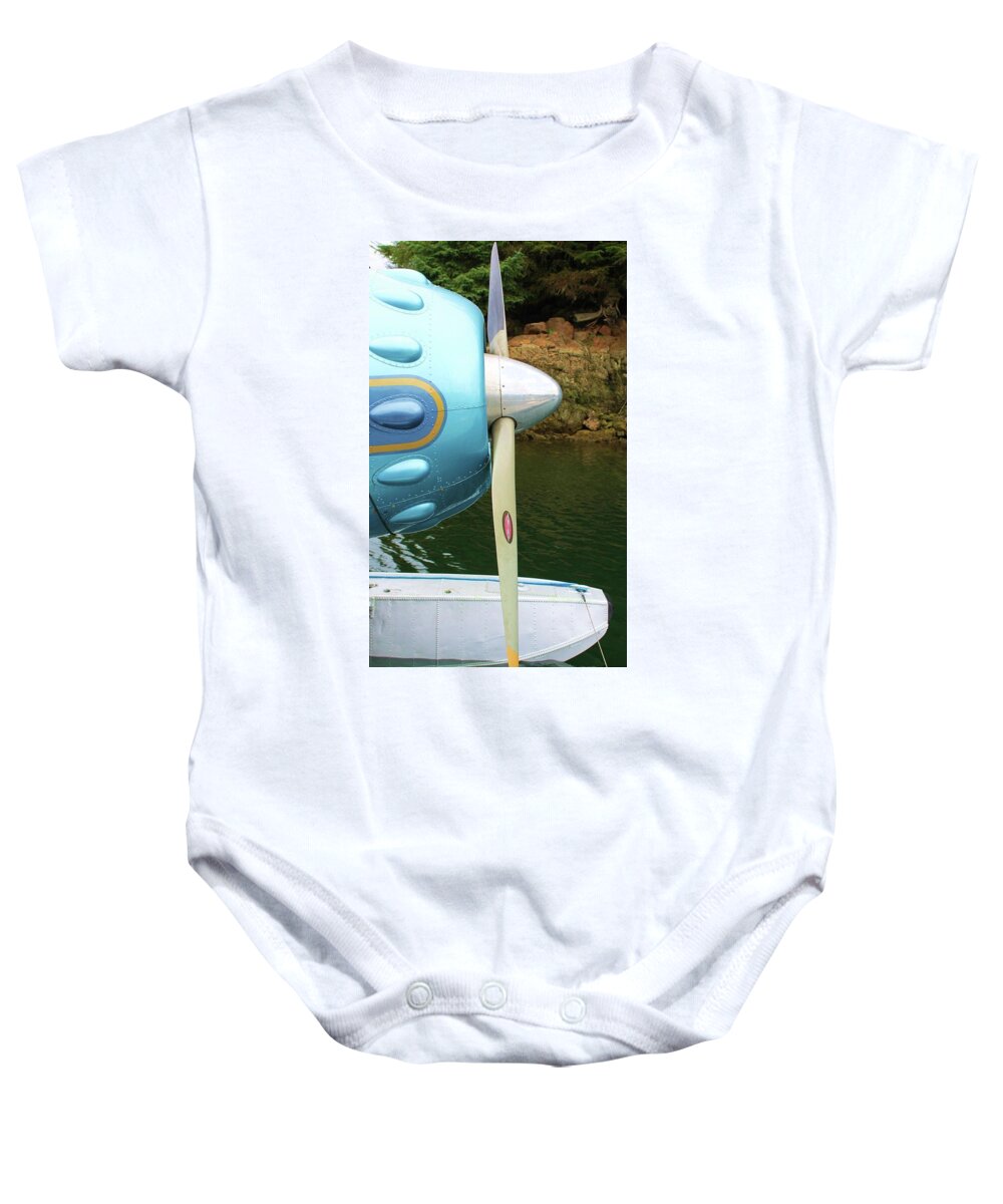 Propeller Baby Onesie featuring the photograph Fly me to the moon by Fred Bailey