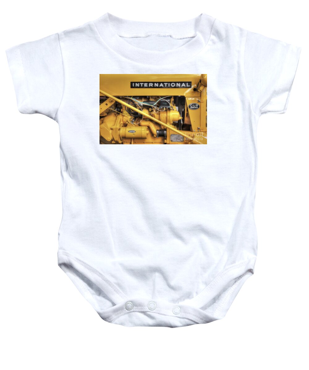 Tractor Baby Onesie featuring the photograph International Cub Engine by Mike Eingle