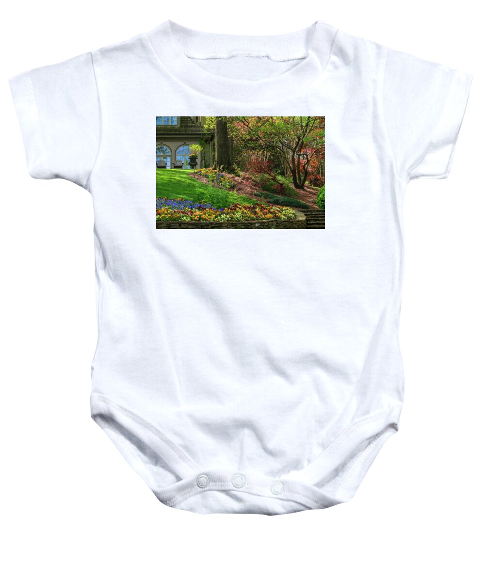 Gibbs Gardens Baby Onesie featuring the photograph Springtime at the Gibbs Gardens Manor House by Mary Ann Artz