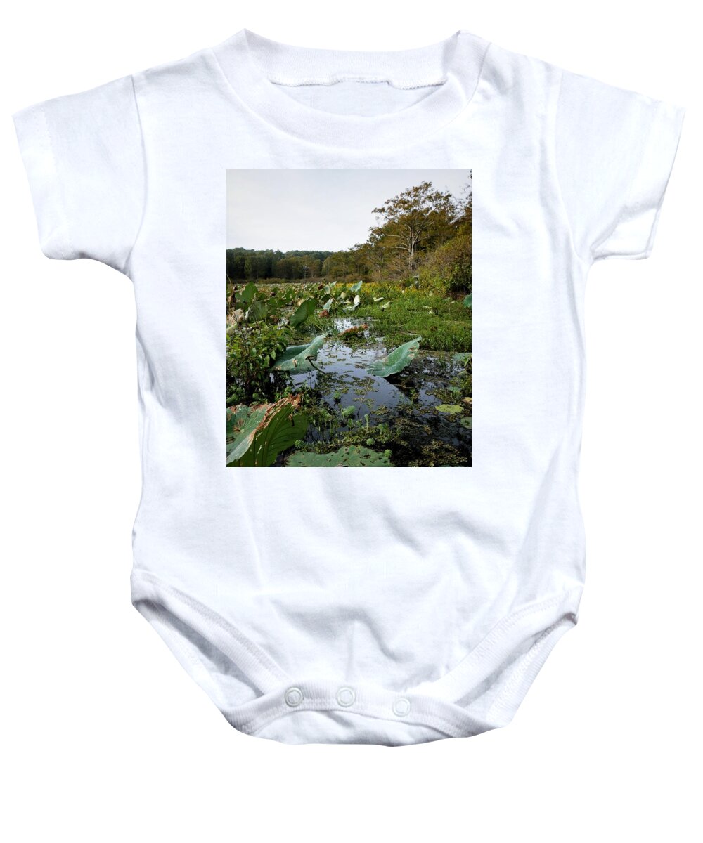 Caddo Baby Onesie featuring the photograph A Small Opening by Buck Buchanan