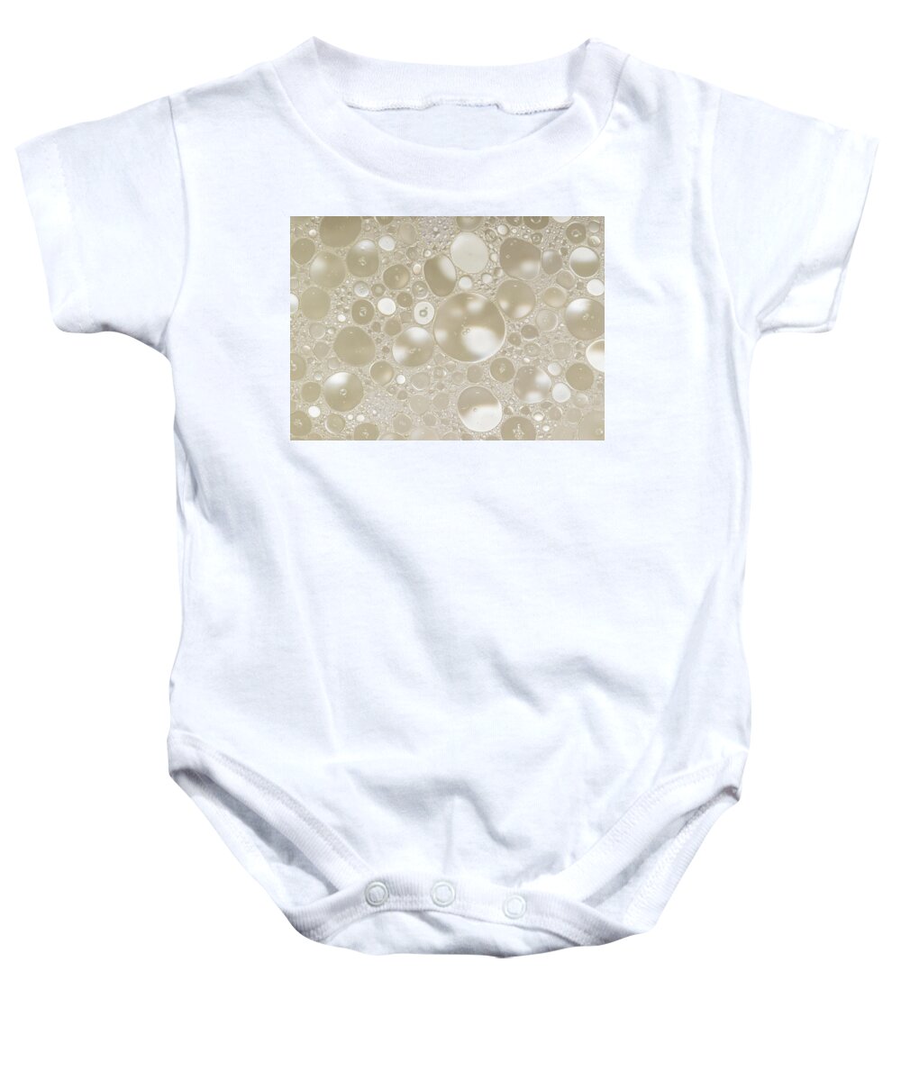 Abstract Photography Baby Onesie featuring the photograph Abstract Photography - Golden Circles by Amelia Pearn