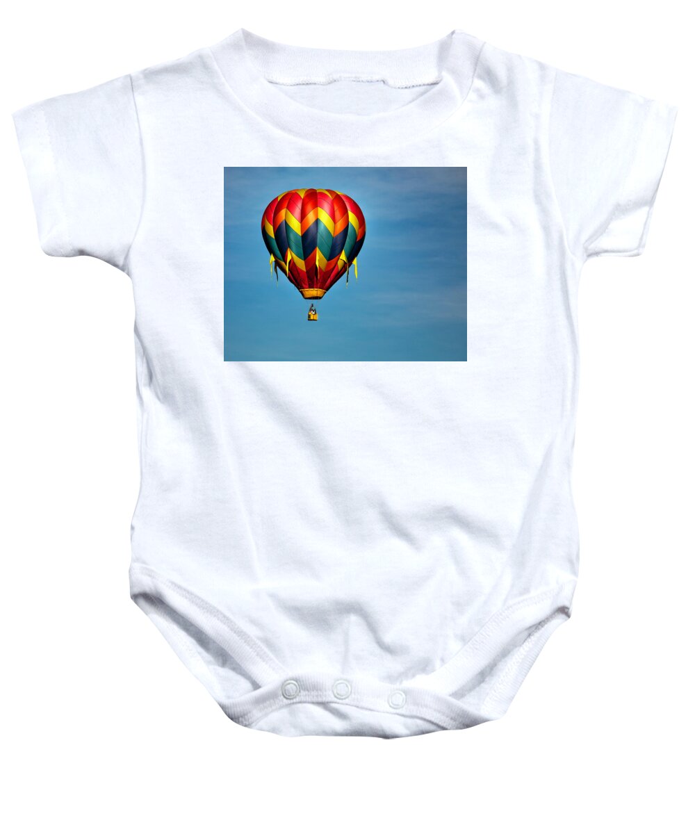 Hot Air Balloon Baby Onesie featuring the photograph Hot Air Balloon in Flight 4 by James Sage