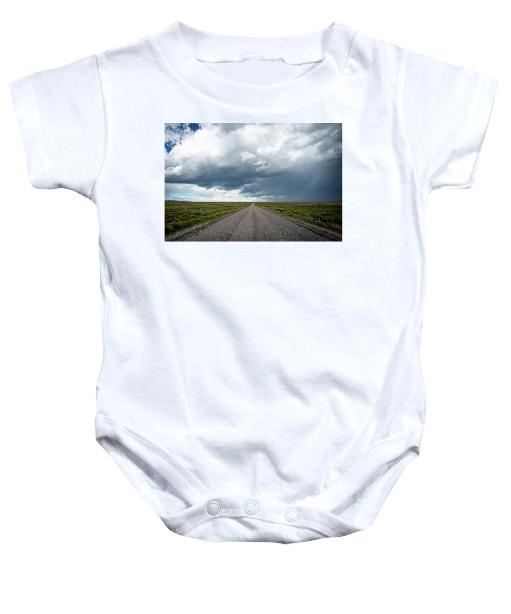 Storm Baby Onesie featuring the photograph Idaho Stormy Road by Wesley Aston