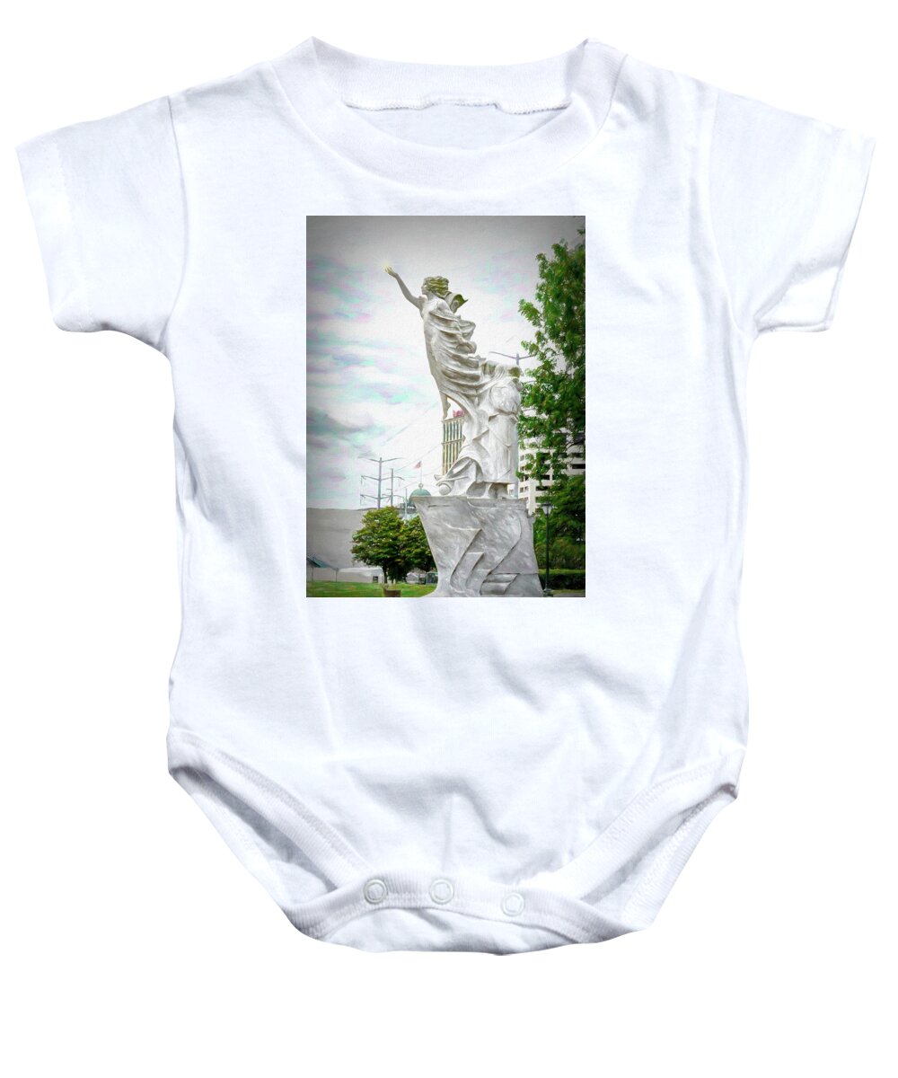 Mississippi River Walk Baby Onesie featuring the photograph Monument To The Immigrant - NOLA Riverwalk by Debra Martz