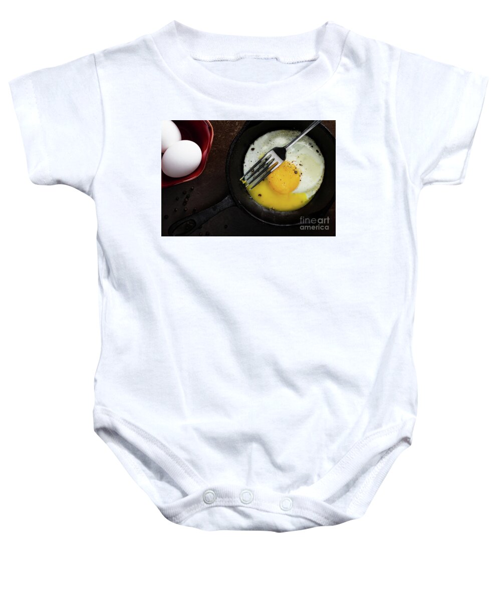 Kitchen Baby Onesie featuring the photograph Rustic Fried Egg by Jarrod Erbe