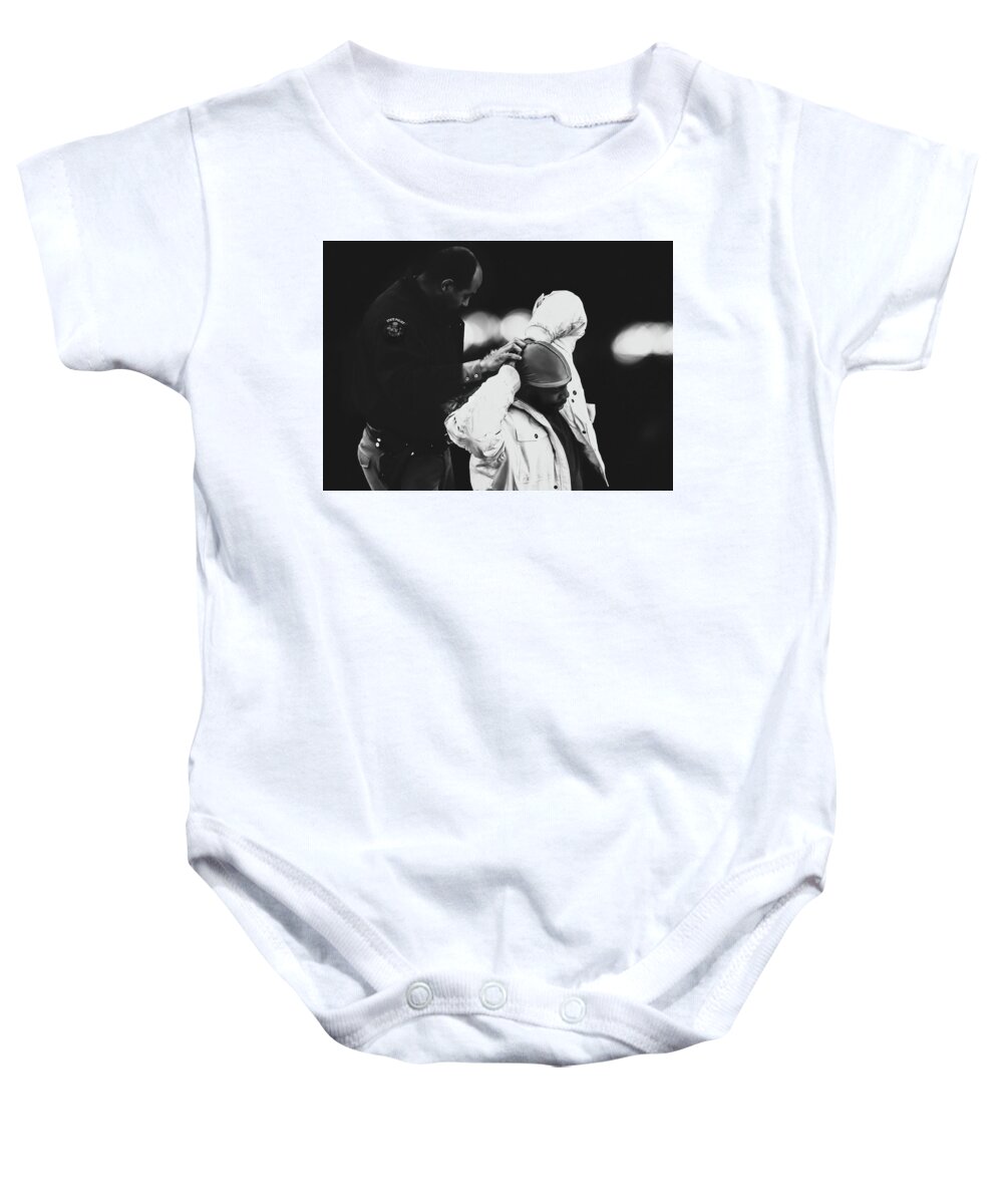 Police Baby Onesie featuring the photograph Suspect by Bob Orsillo
