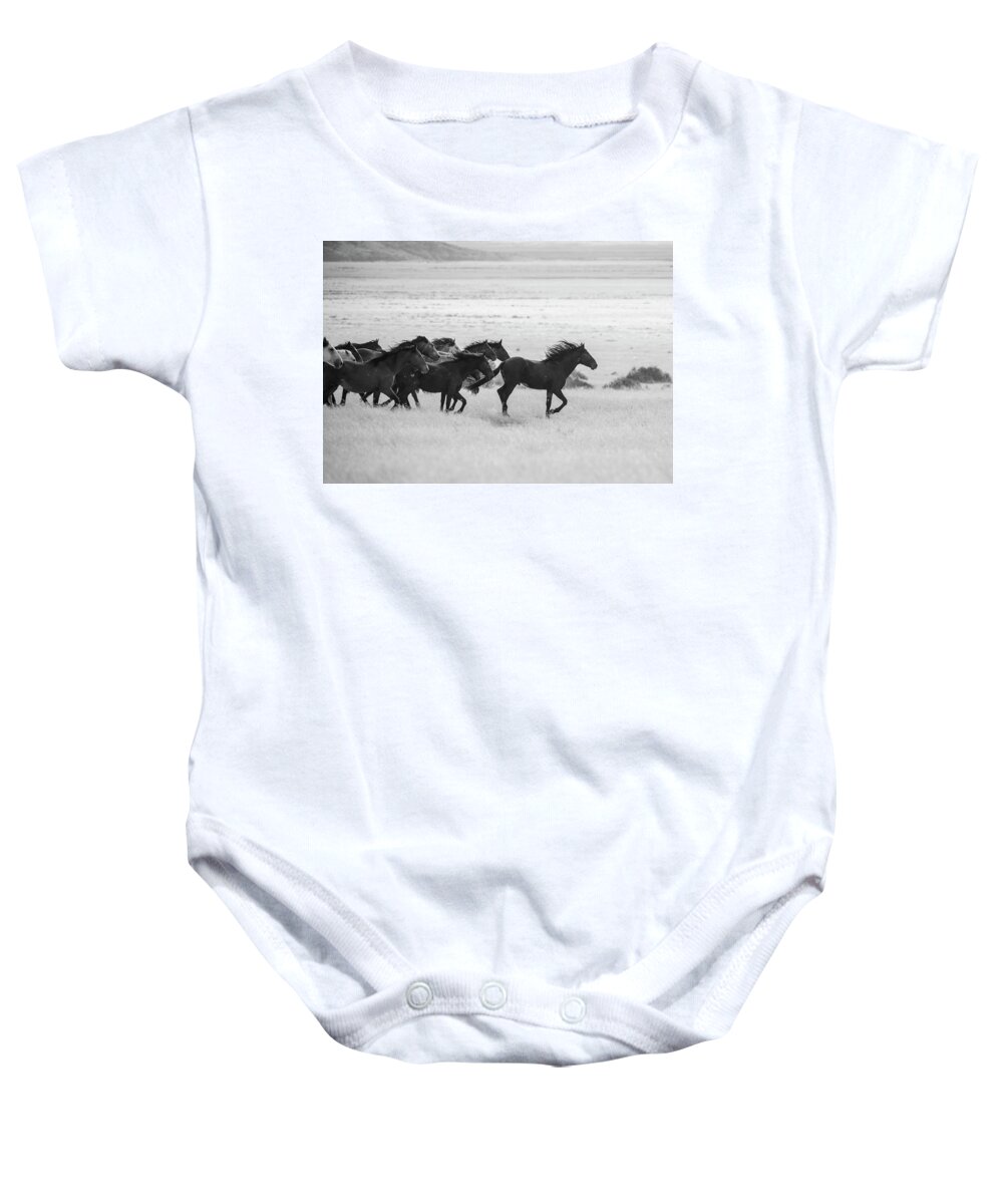 Black And White Baby Onesie featuring the photograph Wild Horses Dash by Dirk Johnson