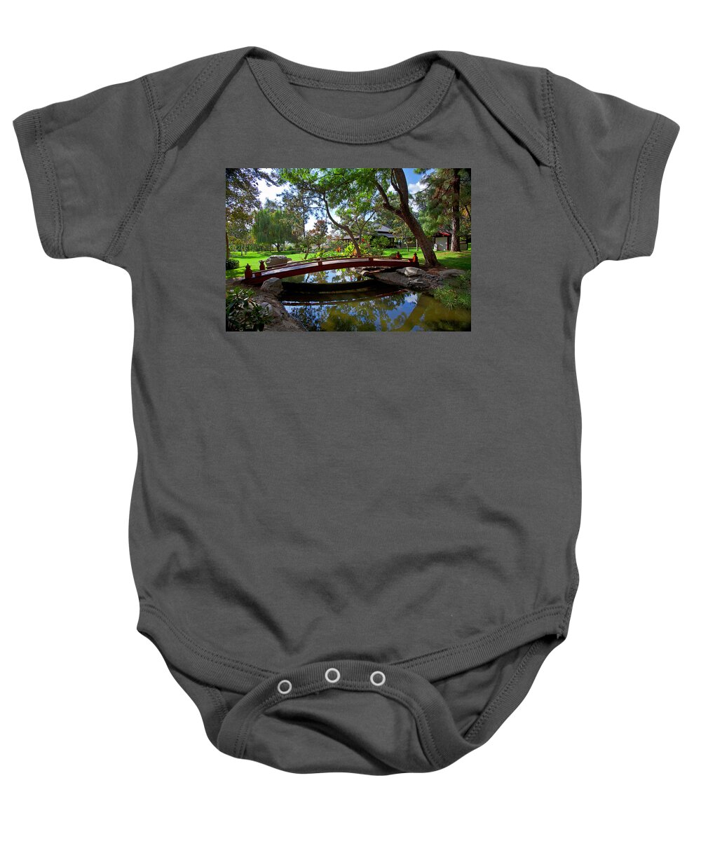 Japanese Gardens Baby Onesie featuring the photograph Bridge over Japanese Gardens Tea House by Jerry Cowart