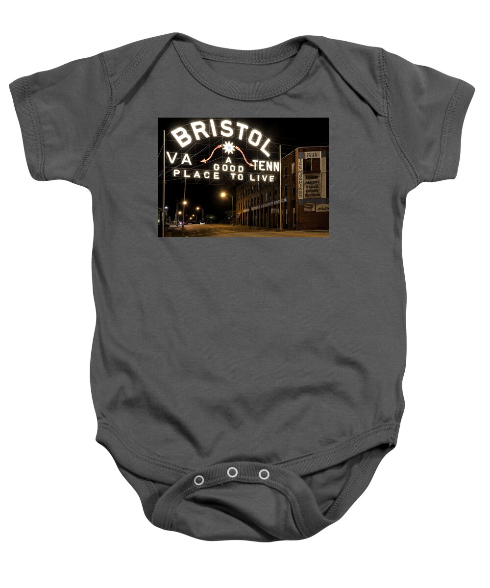 Bristol Baby Onesie featuring the photograph Bristol Sign - Tennessee - Virginia by Brendan Reals