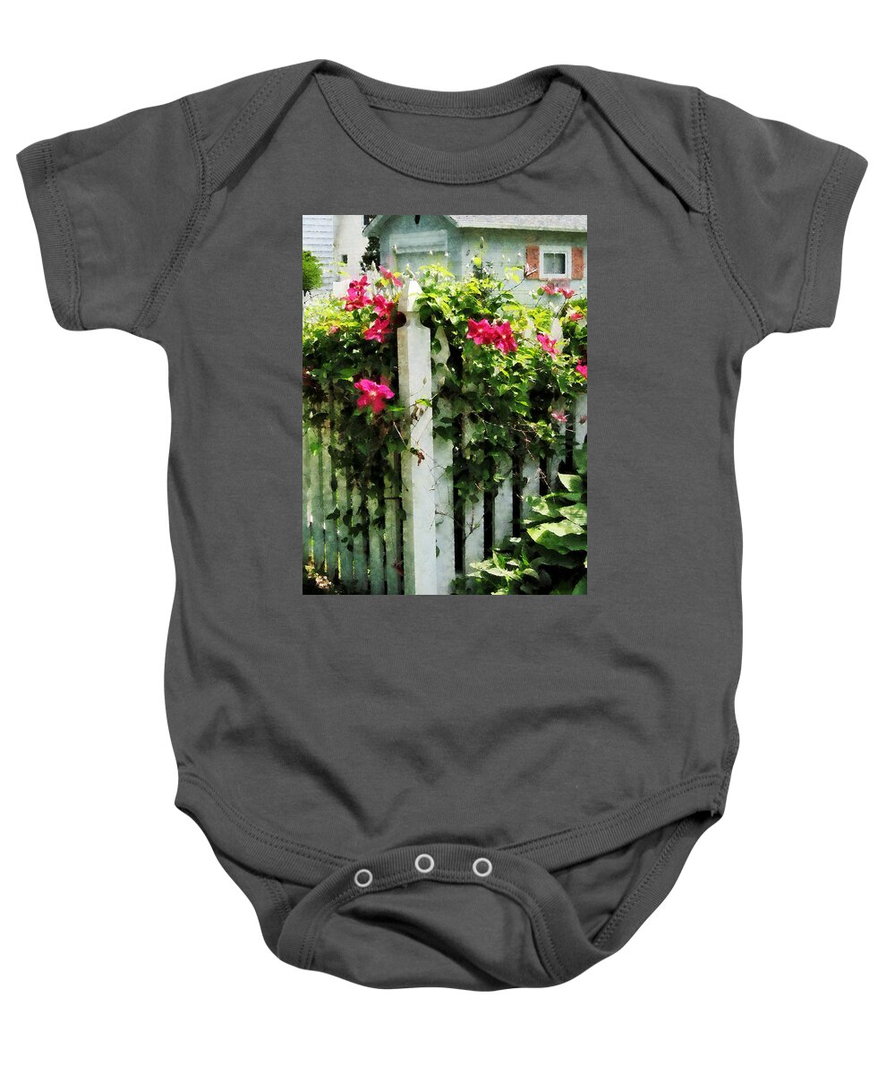 Clematis Baby Onesie featuring the photograph Clematis on Fence by Susan Savad