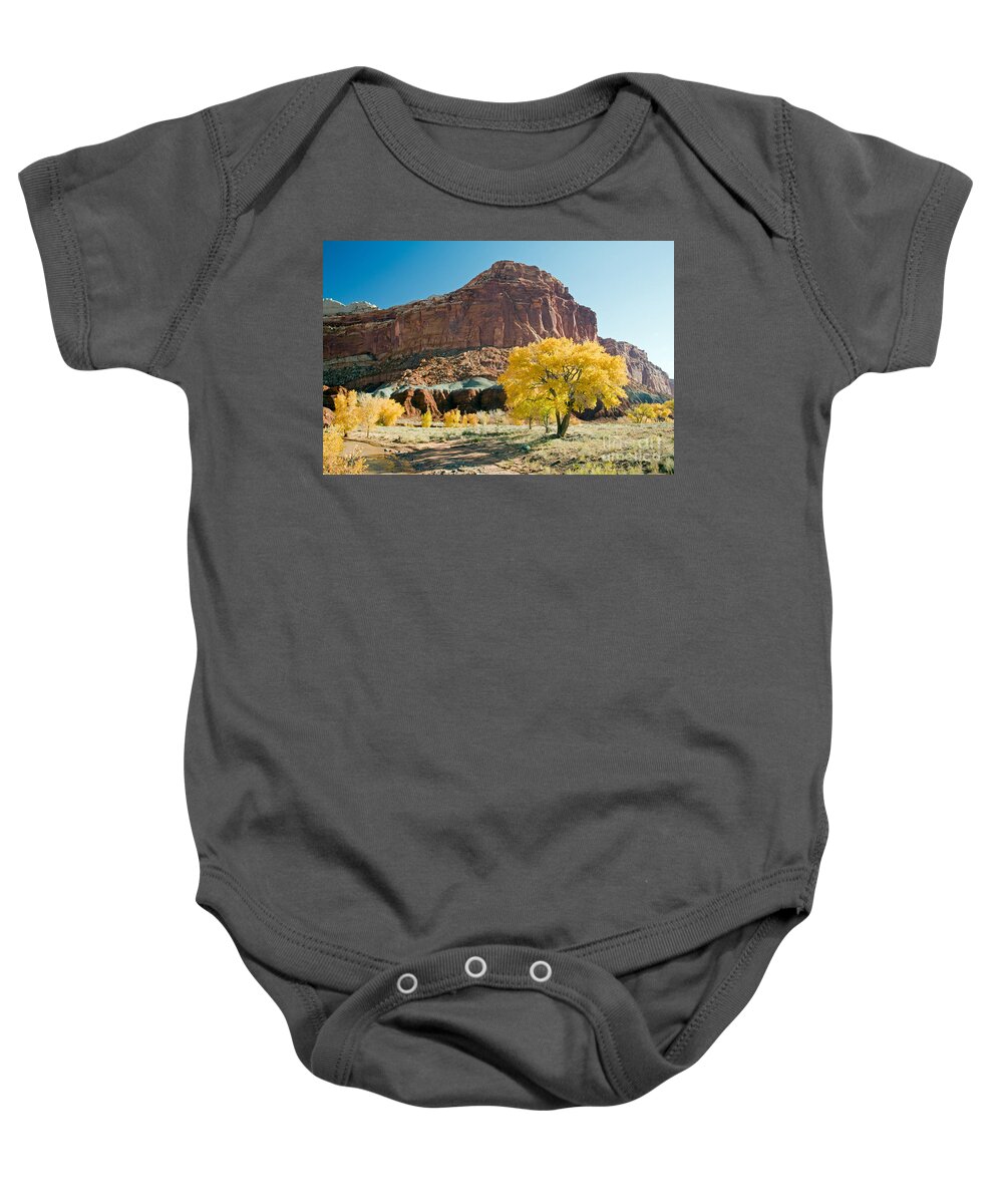 Autumn Baby Onesie featuring the photograph Cottonwoods in Fall The CastleCapitol Reef National Park by Fred Stearns