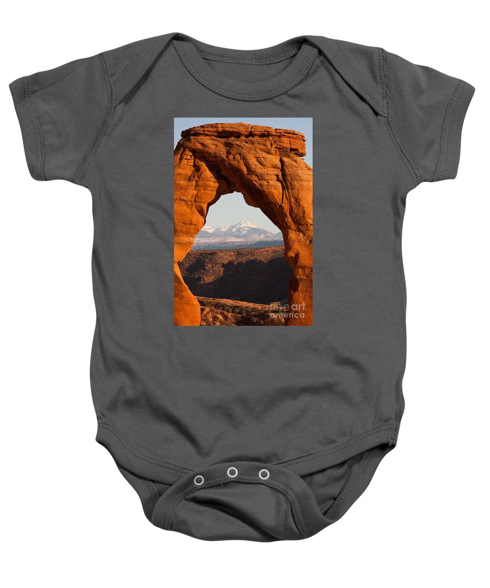 Arches National Park Baby Onesie featuring the photograph Delicate Arch and La Sal Mtns 03 Arches National Park by Dan Hartford